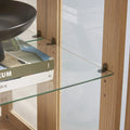 Illuminated Glass Curio Display Cabinet with Adjustable Shelves, Double Doors, and Drawer - Glass Wine Storage Solution