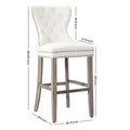 Carter Set of 2 Tufted Wingback Bar Stools with Nailhead Trim and Antique Grey Legs