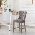 Carter 24-Inch Wingback Tufted Counter Stool with Antique Grey Legs and Nailhead Trim