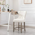 Carter 24-Inch Wingback Tufted Counter Stool with Antique Grey Legs and Nailhead Trim