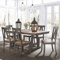 Lindsey Farm 7-Piece Trestle Table Set in Gray and Sandstone