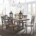 Lindsey Farm 7-Piece Trestle Table Set in Gray and Sandstone