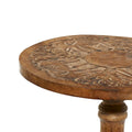 Intricately Carved Dark Brown Mango Wood Accent Table with Elephant or Floral Design and Turned Base - Roche River Decor