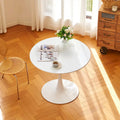 Round Tulip Dining Table in Mid-Century Modern Style