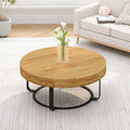 Contemporary Round Wooden Coffee Table with Intricate Carving and Metal Legs